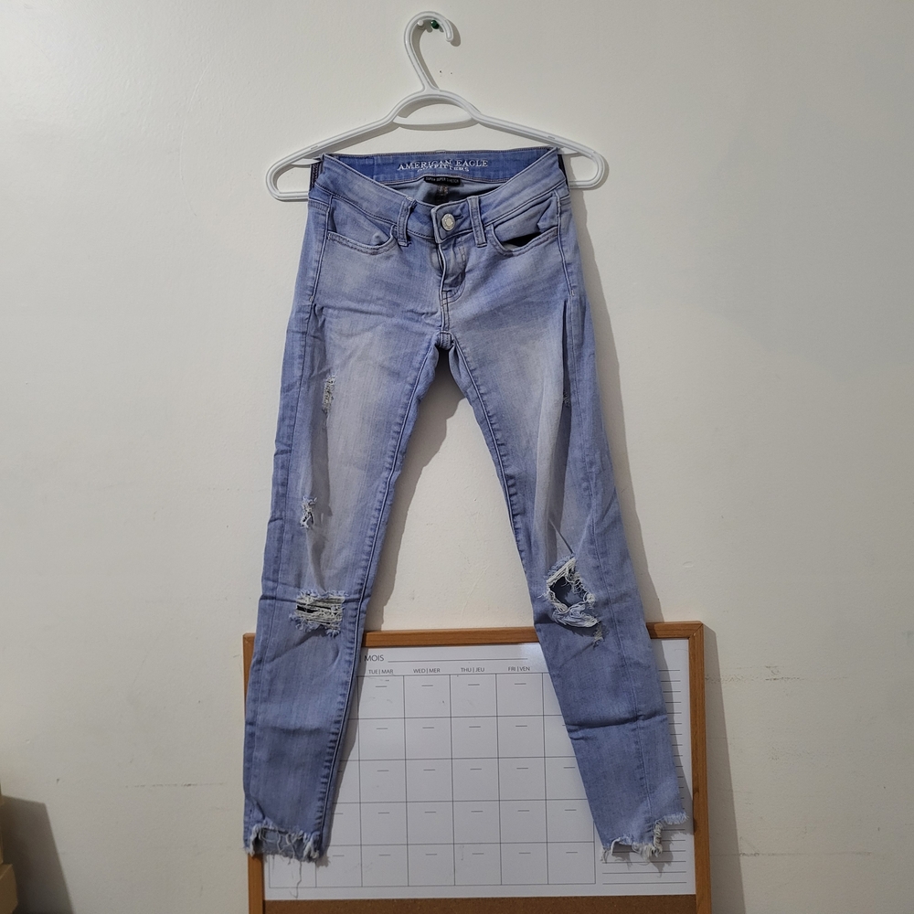 Distressed Light Blue Jeans
